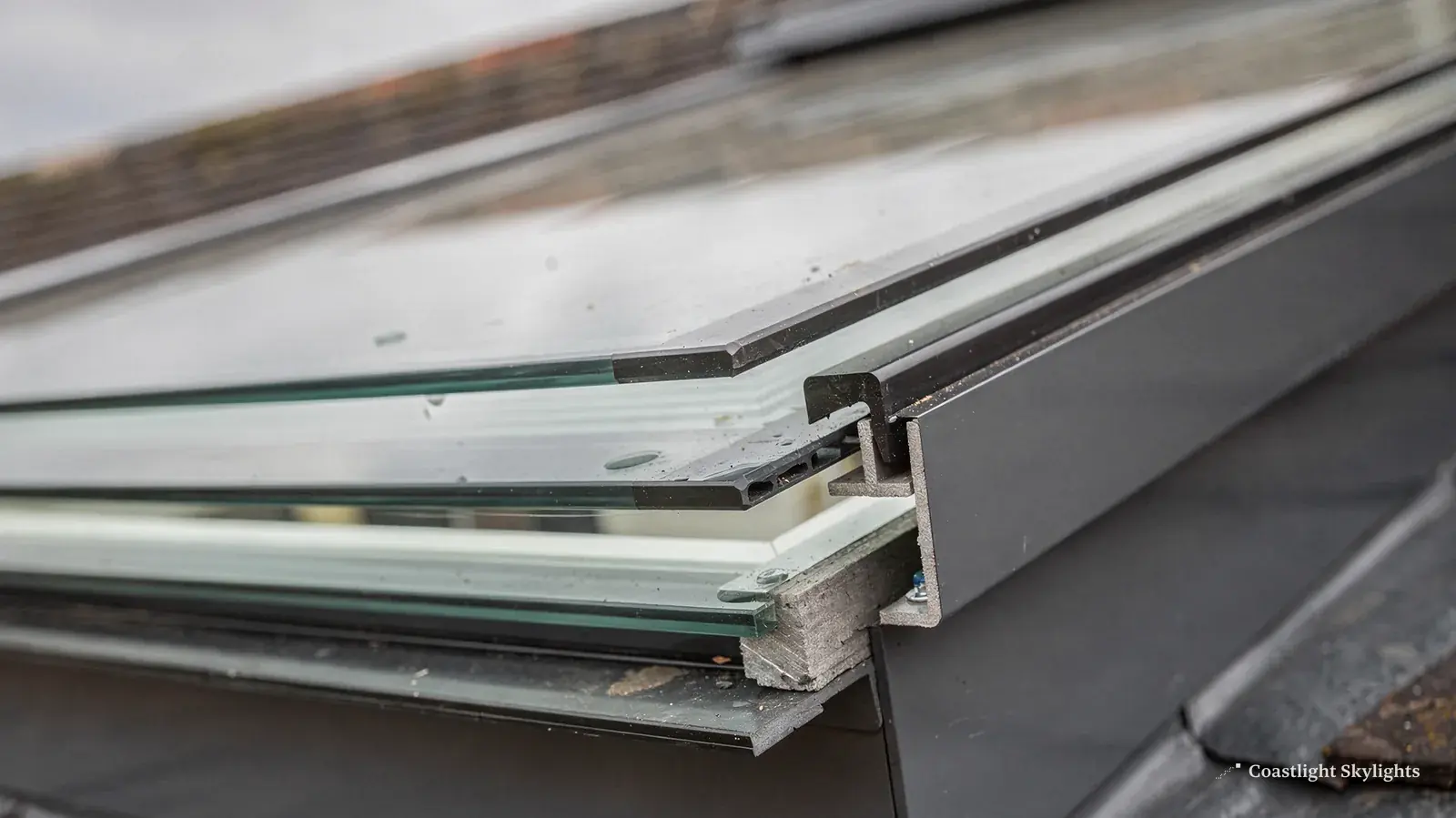 Close view of the layered edge of a glazed rooflight unit